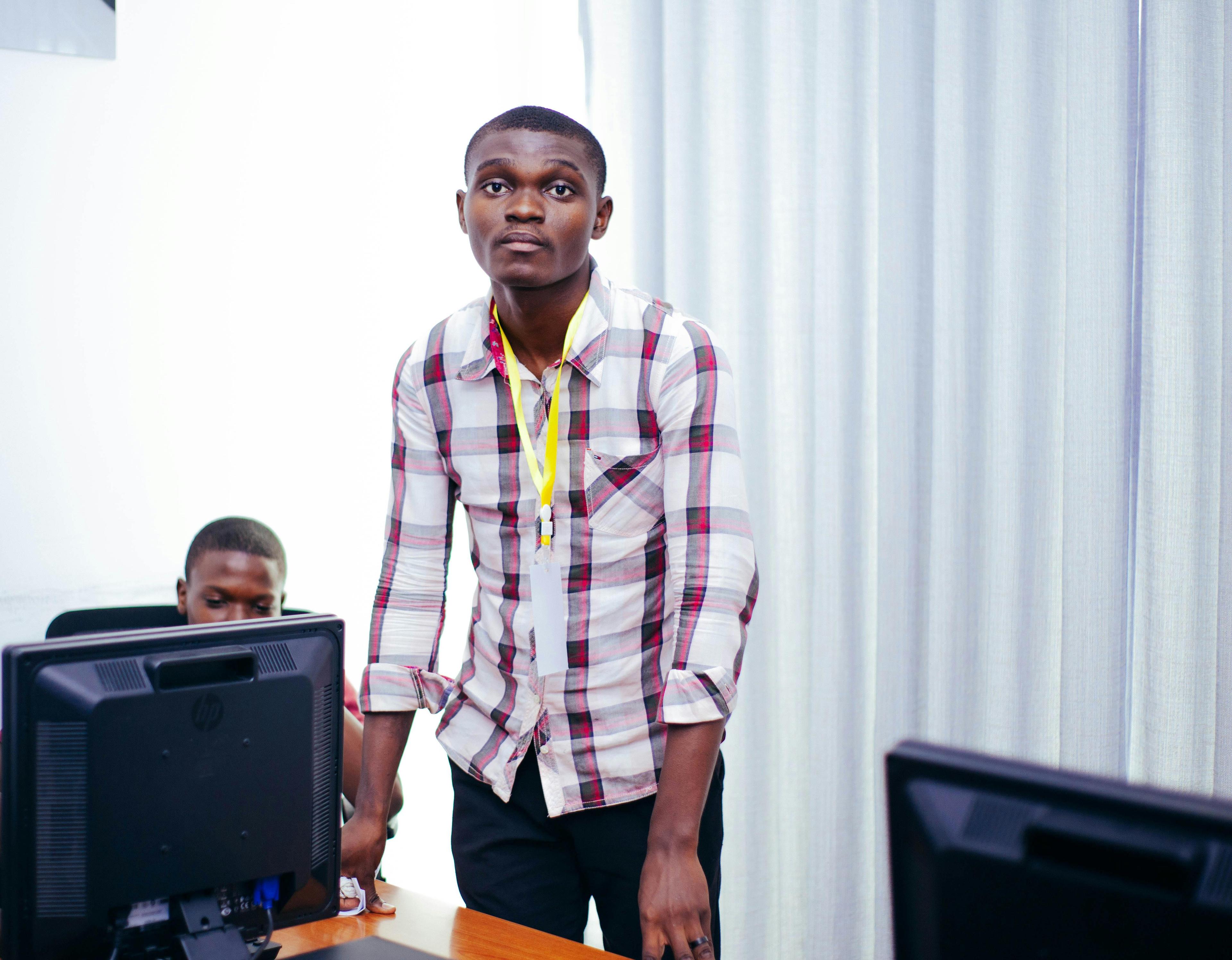 Computer instructor teaching students