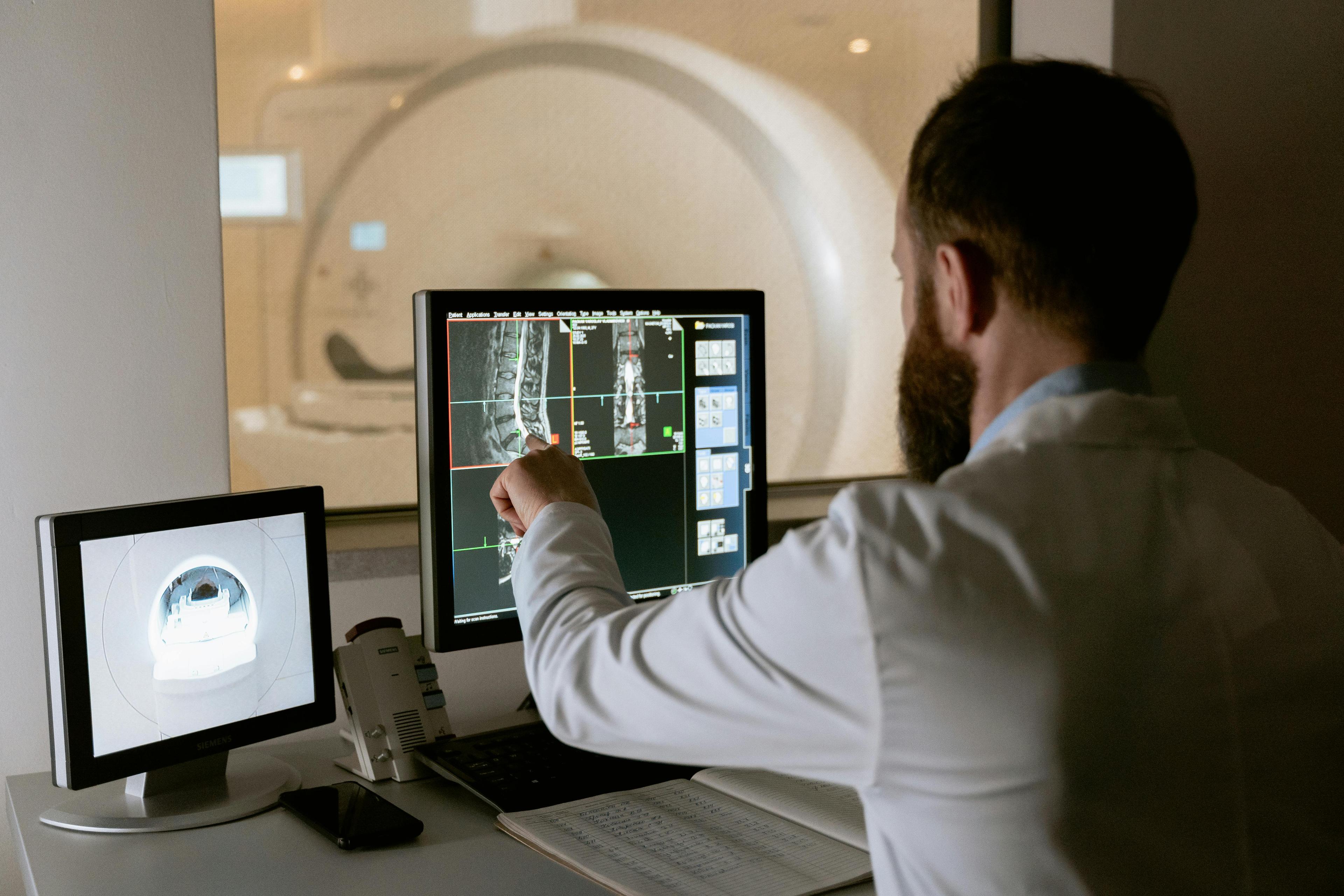 Engineer pointing at a monitor